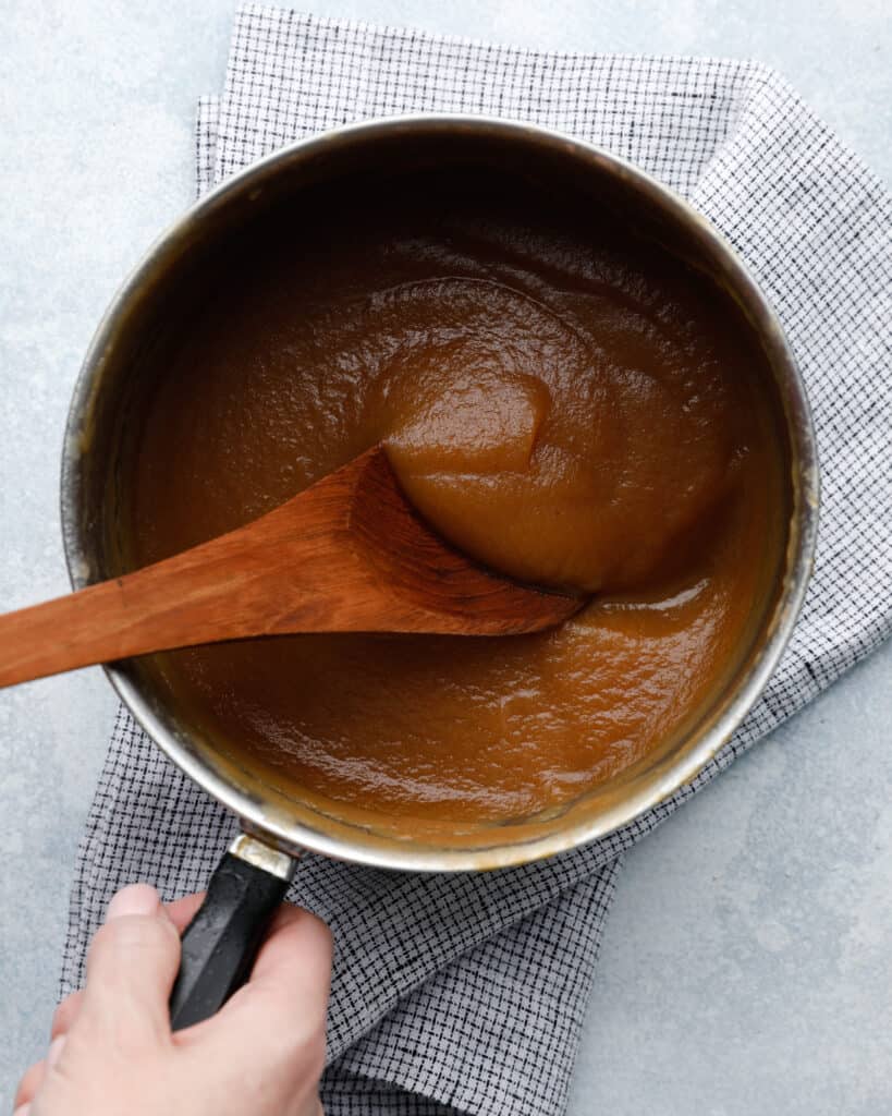an overhead view of a sauce pan with apple butter