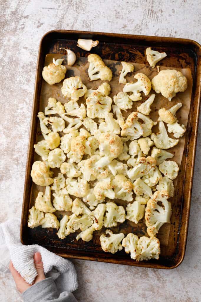 overhead view of a pan of roasted cauliflower from the oven