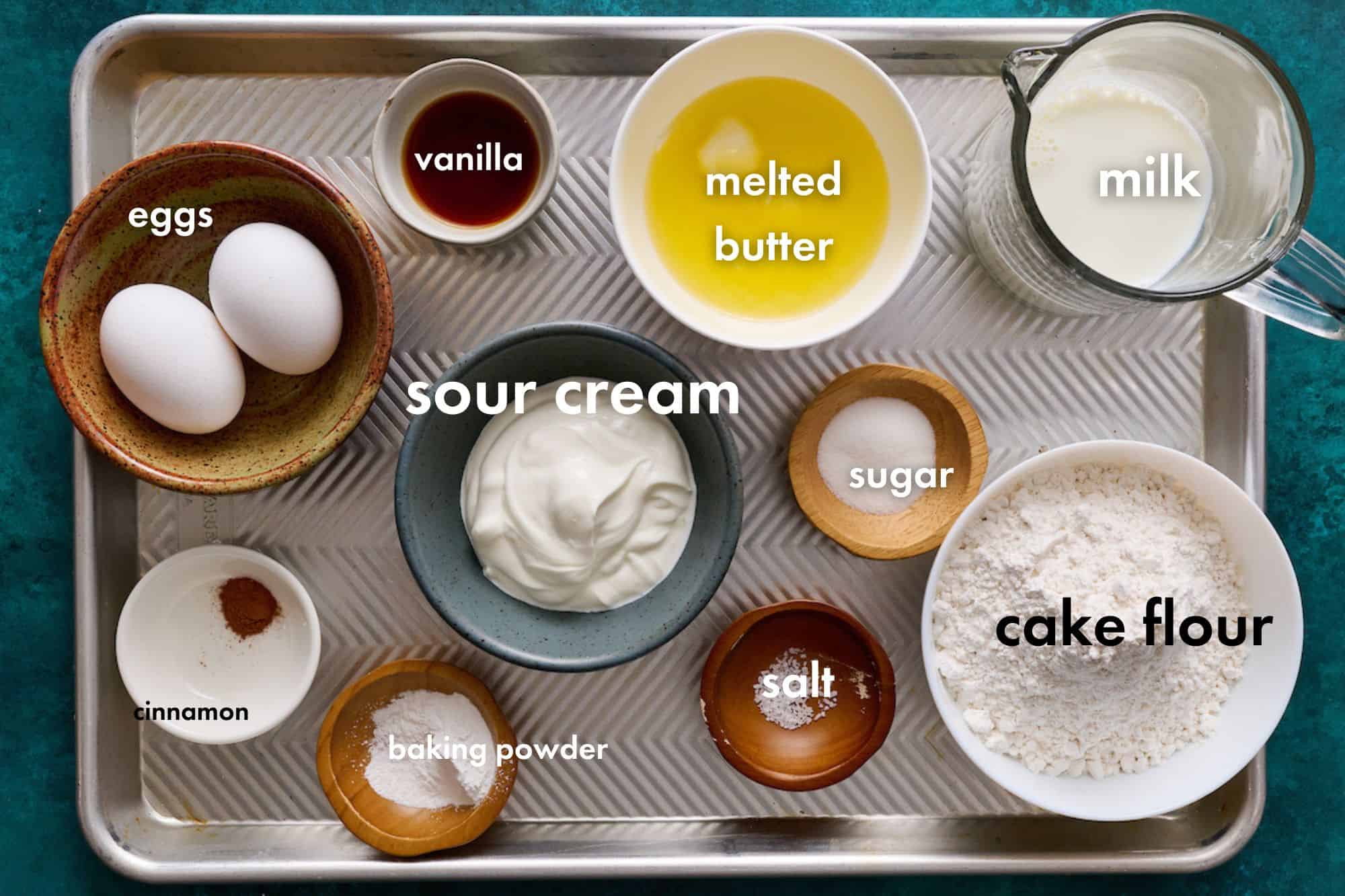 ingredients for sour cream waffles arranged on a counter