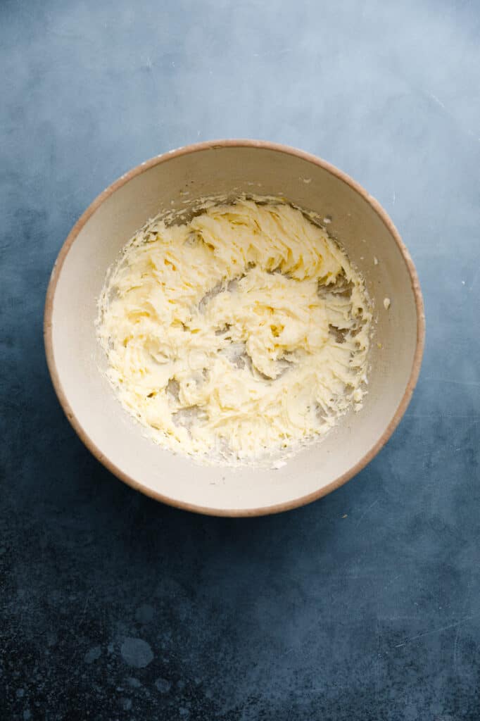 bowl with eggs and sugars beaten