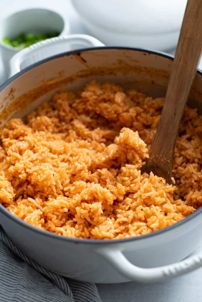 A dish of Mexican Style rice in a dutch oven after being baked