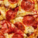 closeup photo of cottage cheese crust pizza with cheese and pepperoni