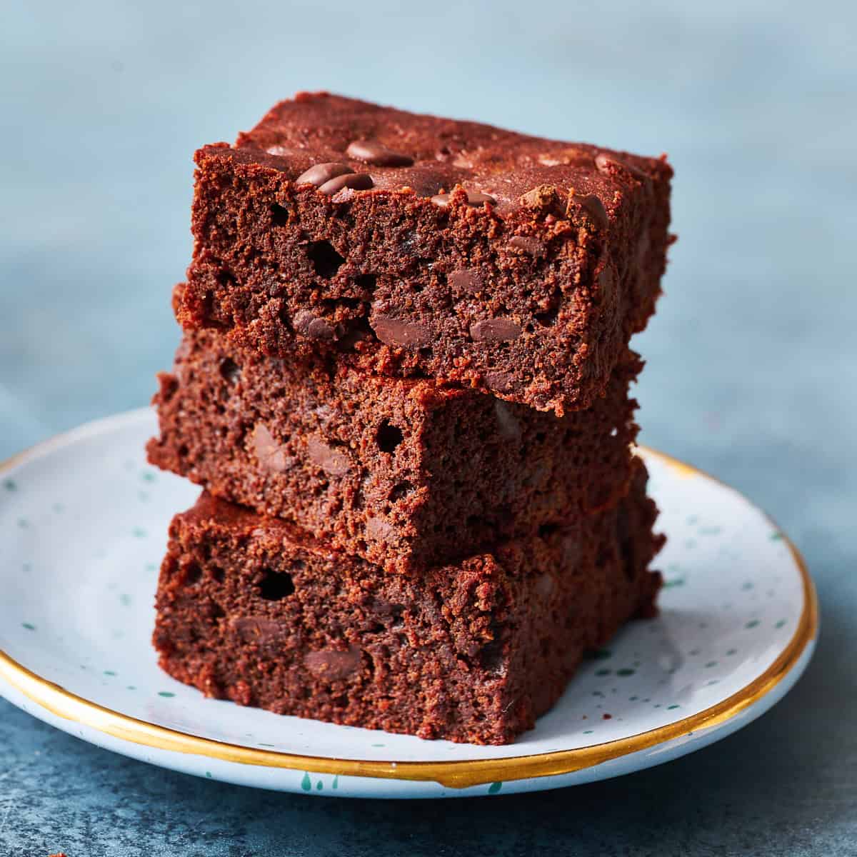 a stack of three paleo brownies