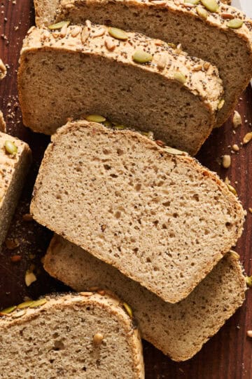 overhead view of slices of sorghum bread on a cutting board