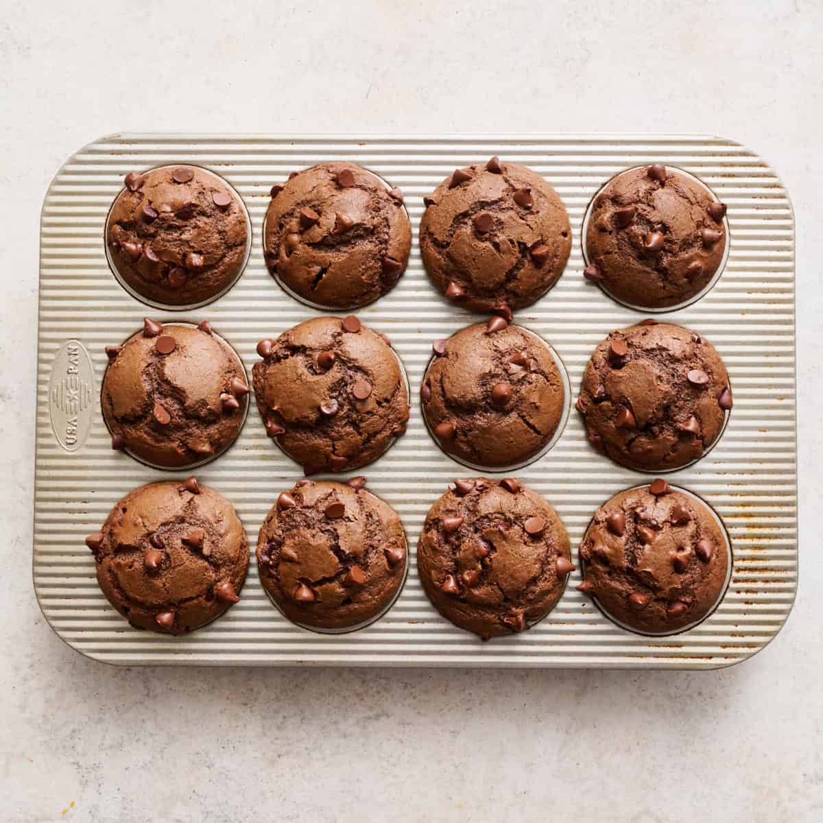 muffins in a muffin tin after being baked