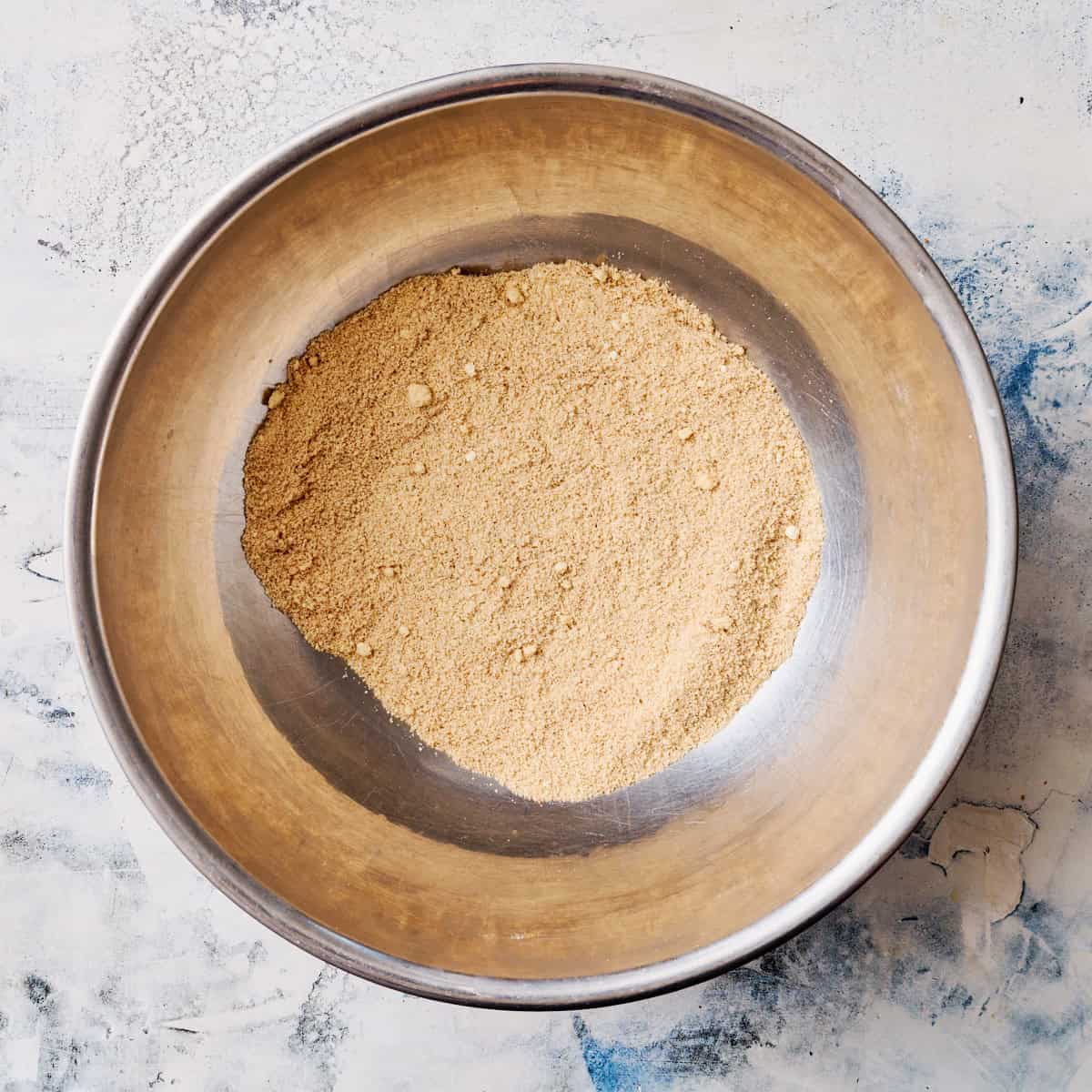 combining the dry ingredients in a large mixing bowl for the cake batter