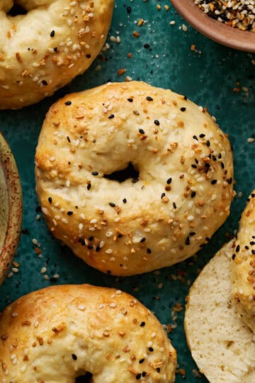 bagels with golden brown crust and topped with everything bagel seasoning
