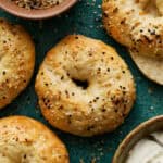 Bagels that are golden brown with everything bagel seasoning
