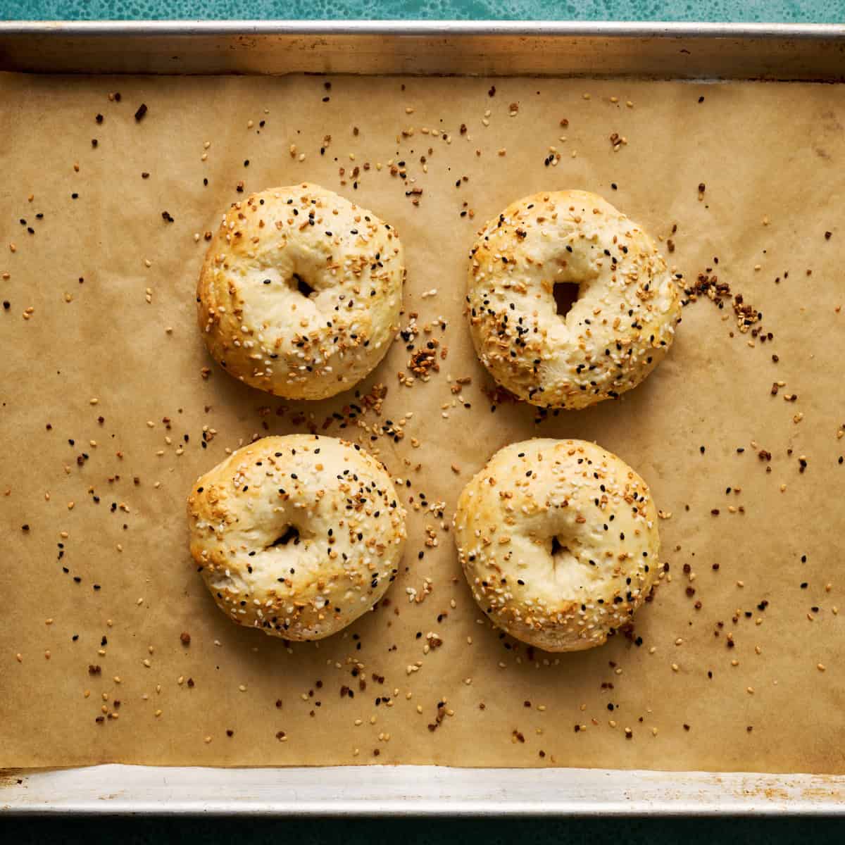 Bagels on a baking sheet after being baked