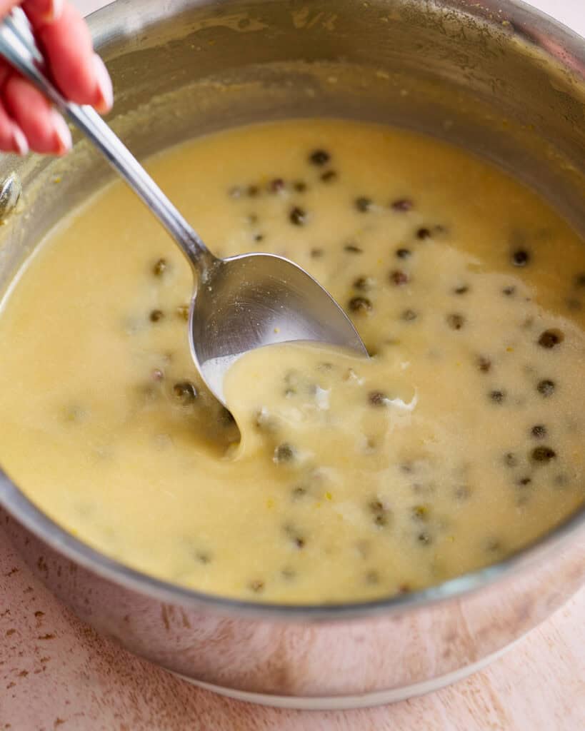 stirring lemony butter piccata sauce