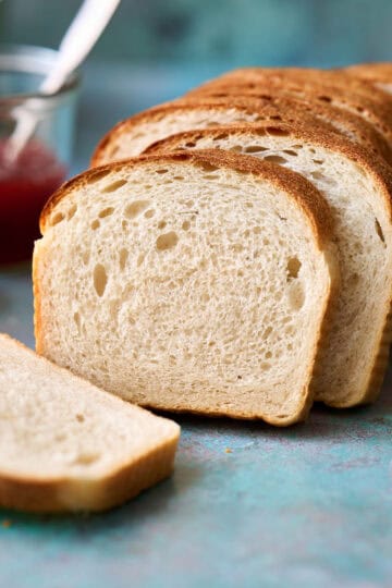 sandwich bread sliced with a bread knife