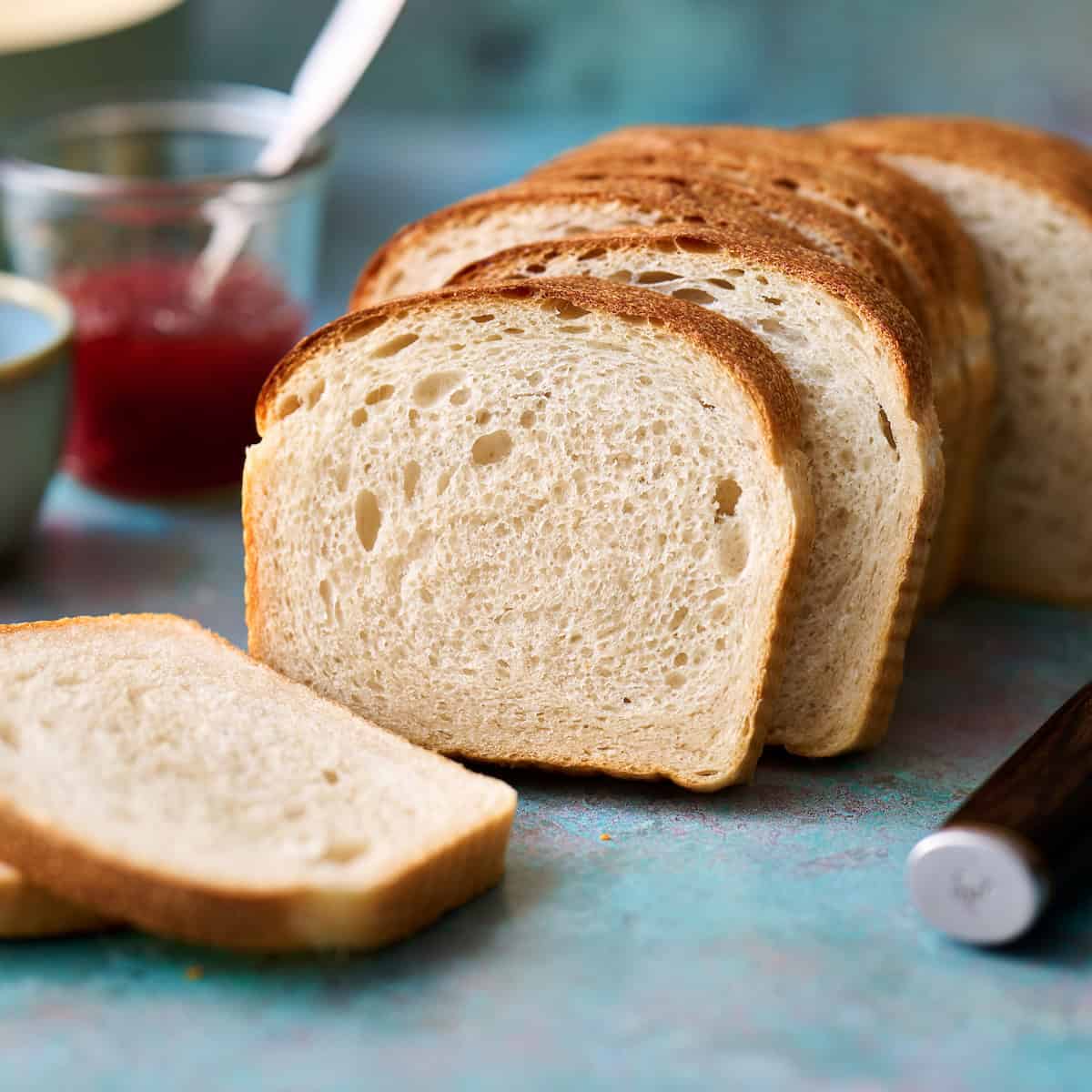 sandwich bread sliced with a bread knife