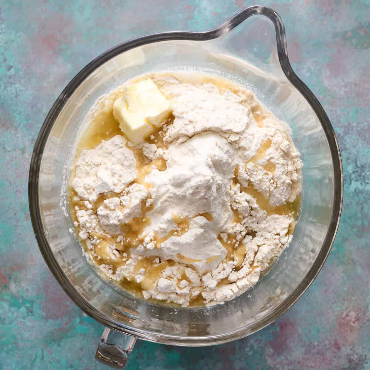adding dry ingredients to the wet to make the dough