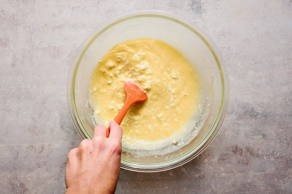 stirring the cottage cheese into the egg mixture