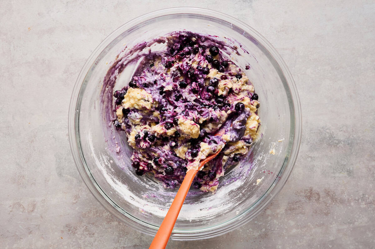 cottage cheese blueberry muffin batter in a mixing bowl