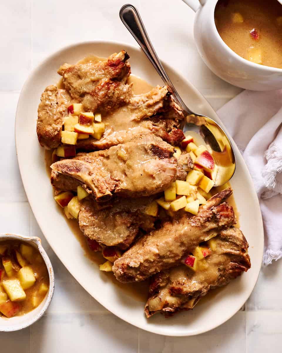 Slow Cooker Country Style Pork Ribs with Apple Gravy on a serving platter