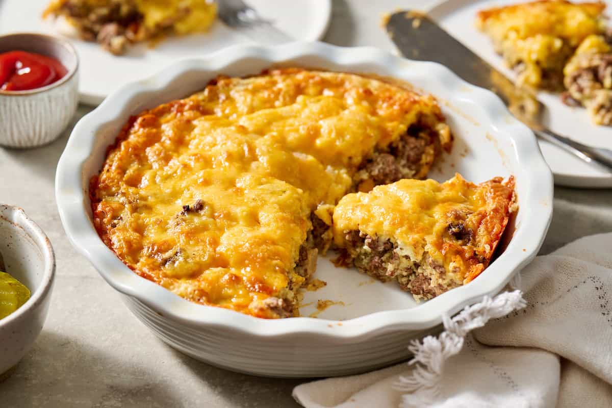 Cheeseburger Pie being served on white plates