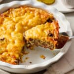 Cheeseburger Pie being served on white plates