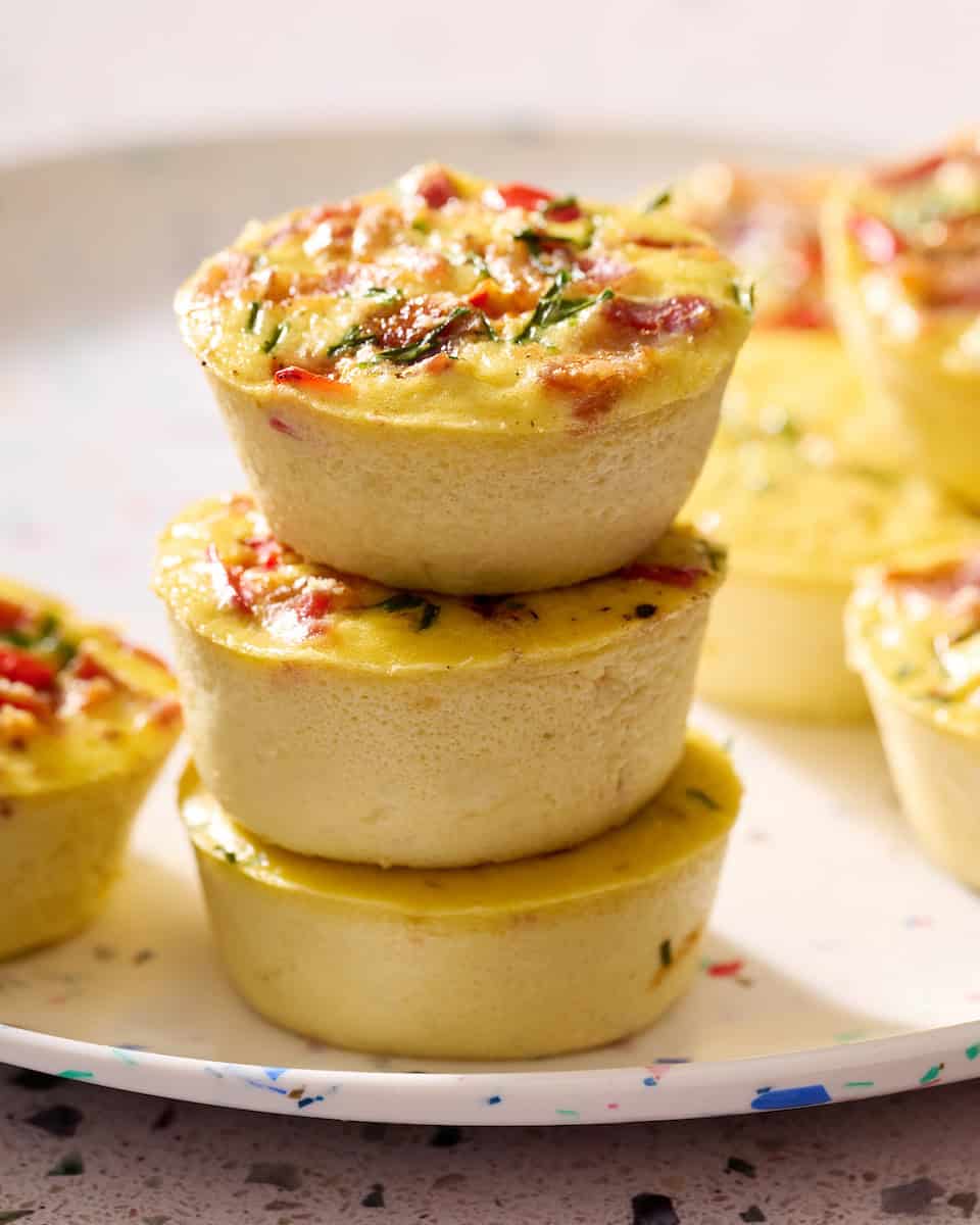 egg bites stacked on a plate
