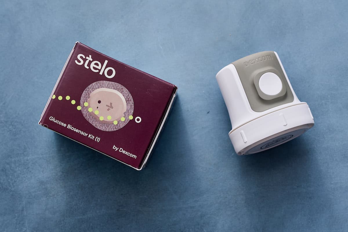 a CGM and its box on a table