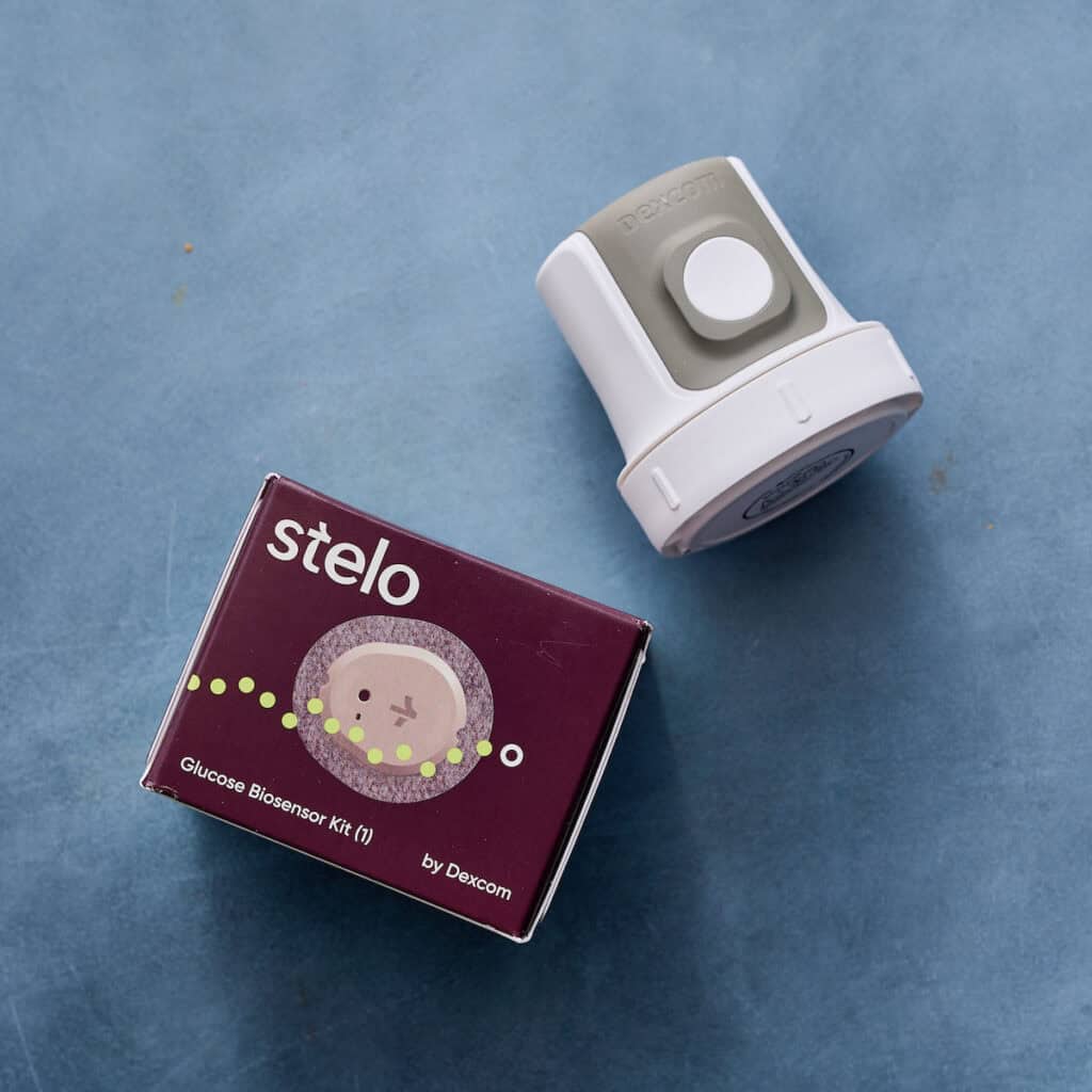 a CGM and box on a table