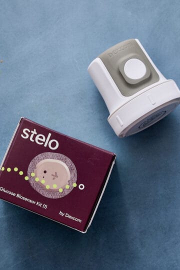 a CGM and box on a table