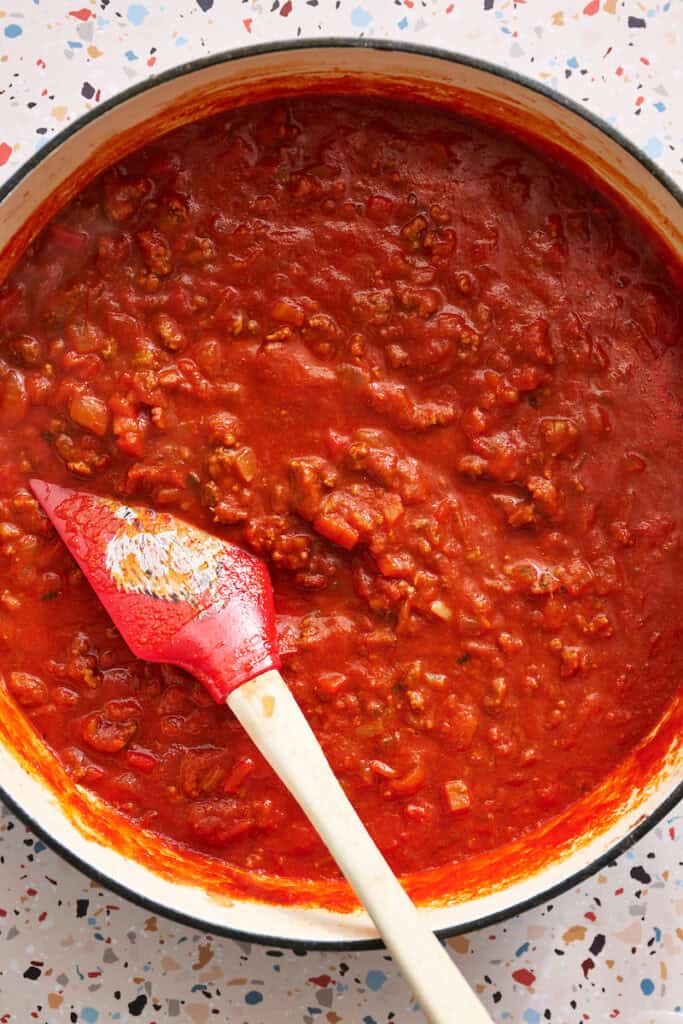 beef and sauce combined in a saucepan