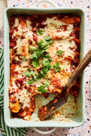 Ground Beef Enchiladas in a casserole pan