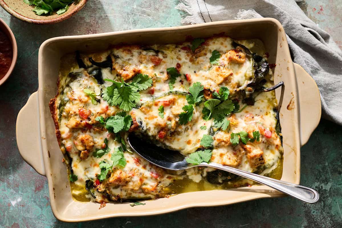 final chicken stuffed poblano peppers dish with cilantro on the side