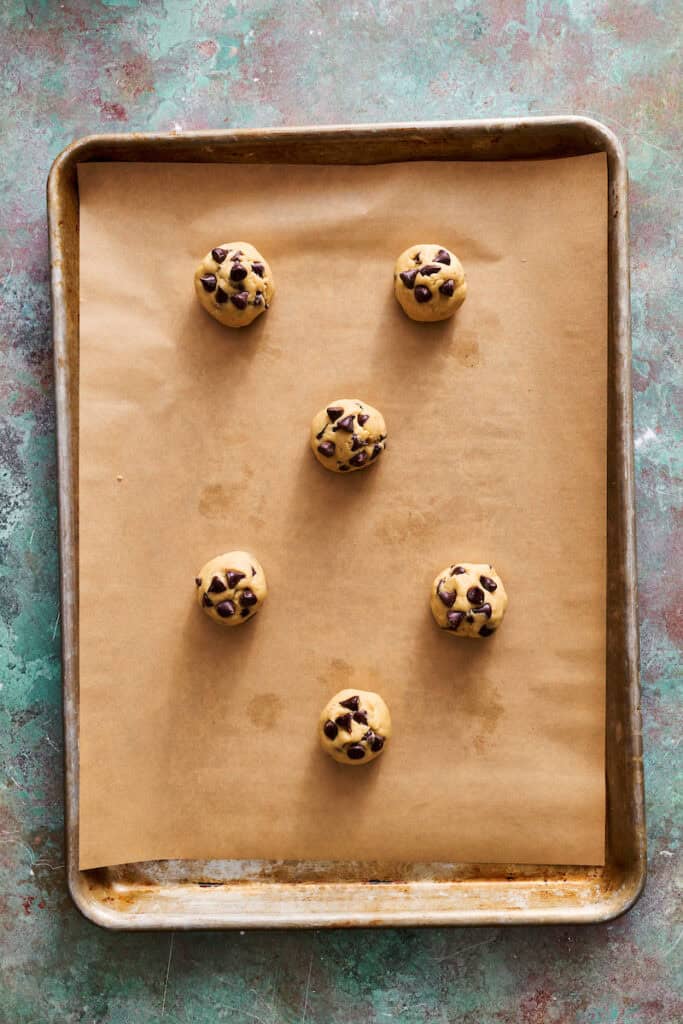 dough balls measured onto a baking sheet