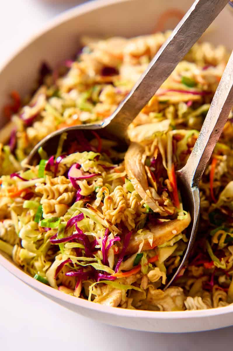 closeup scooping ramen noodle salad