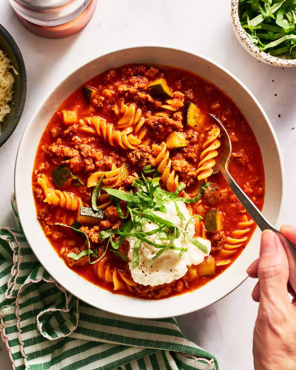 enjoying a bowl of lasagna soup