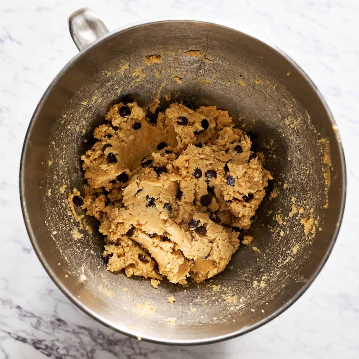 Combining the wet and the dry along with the chocolate chips or other mix in