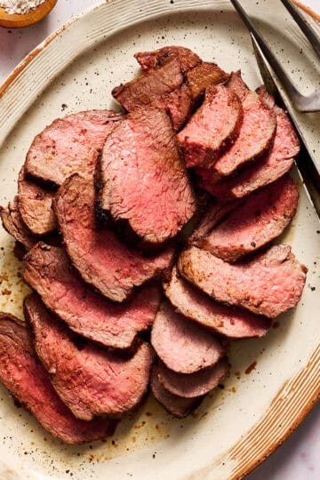 tri tip roast sliced and served