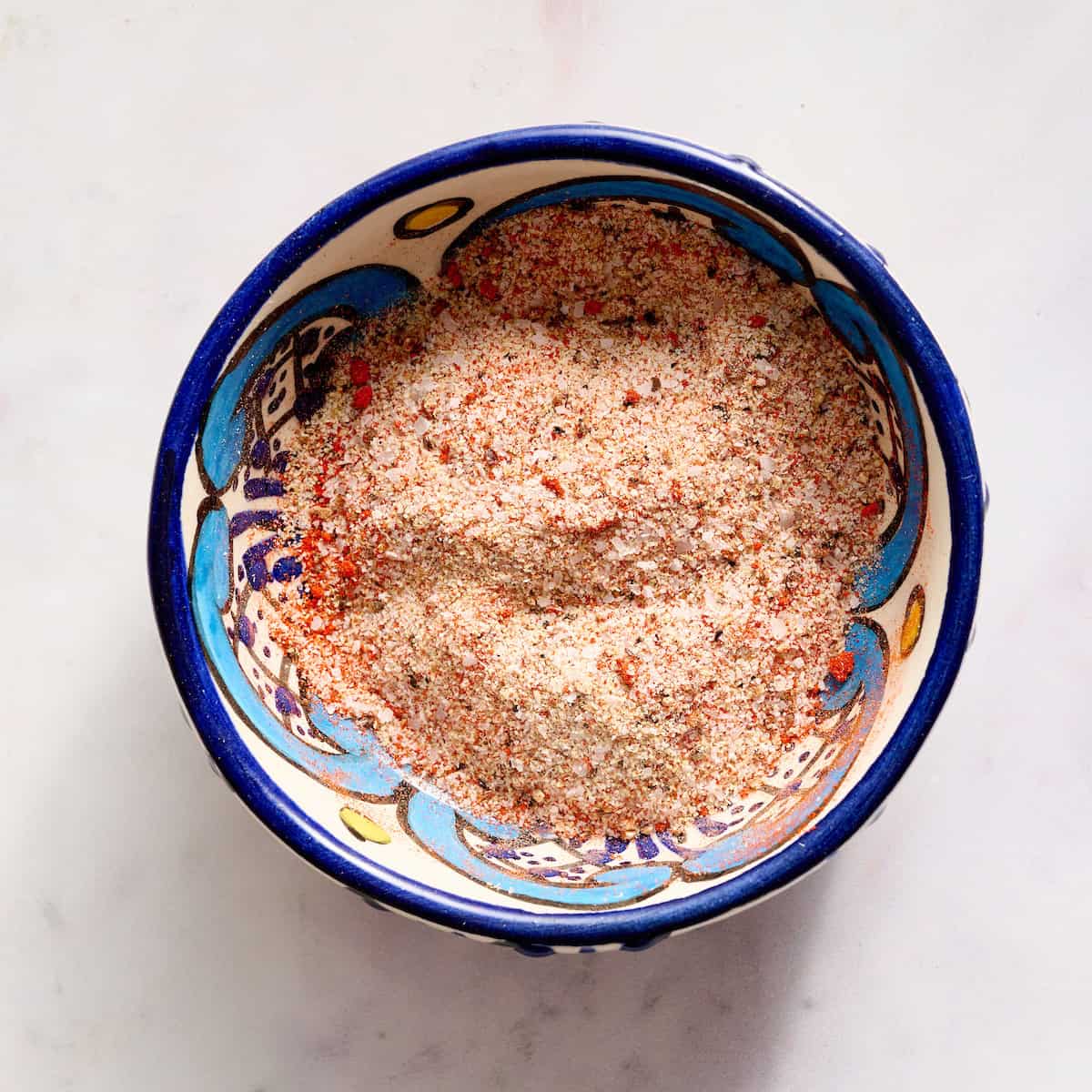 spices, salt and sugar tossed together in a small bowl