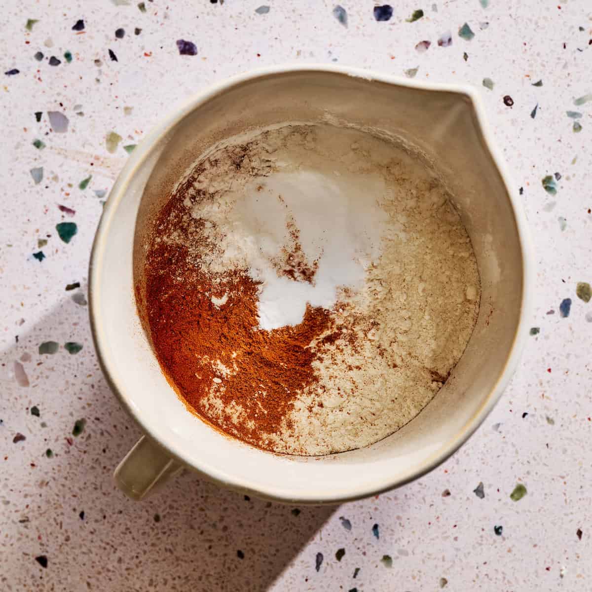 dry ingredients combined into a mixing bowl