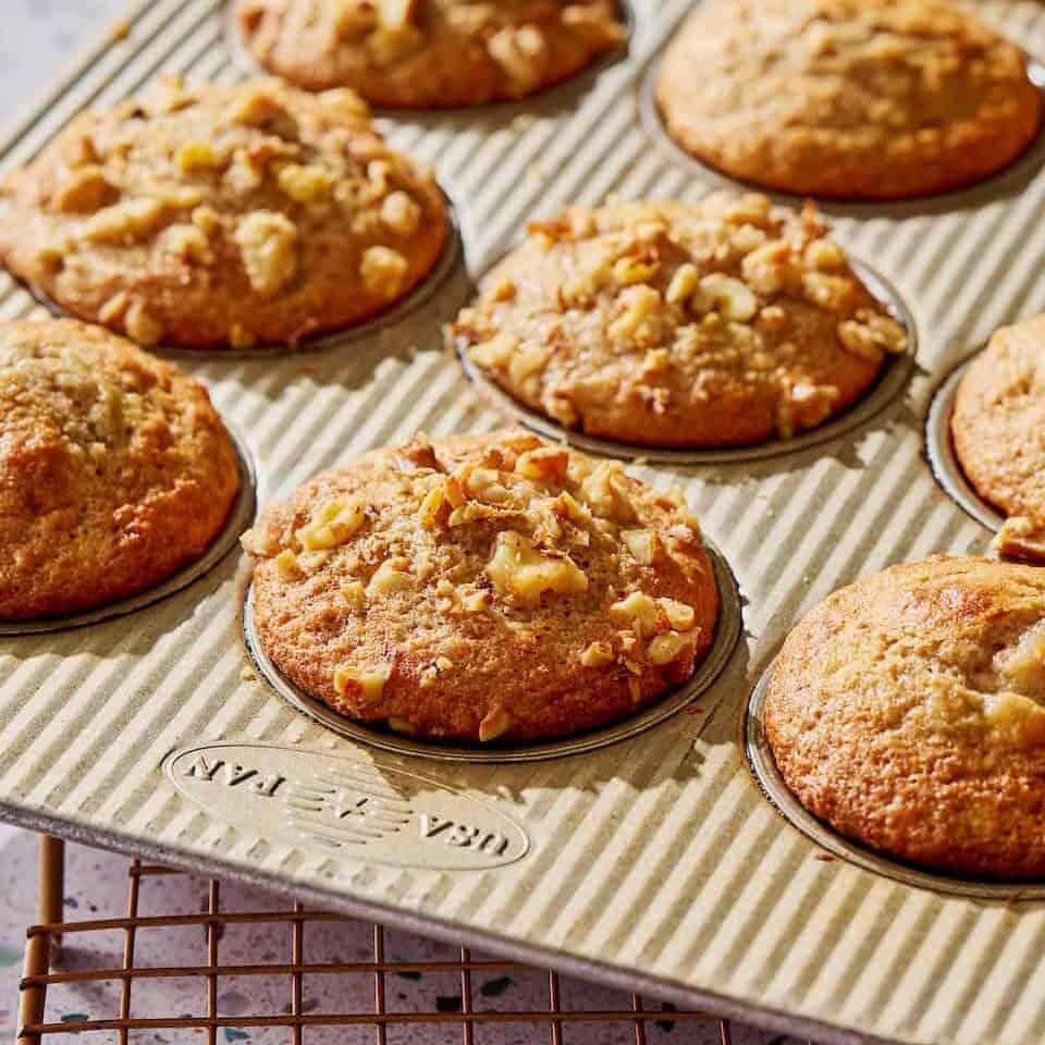 sourdough banana muffins in a muffin tin