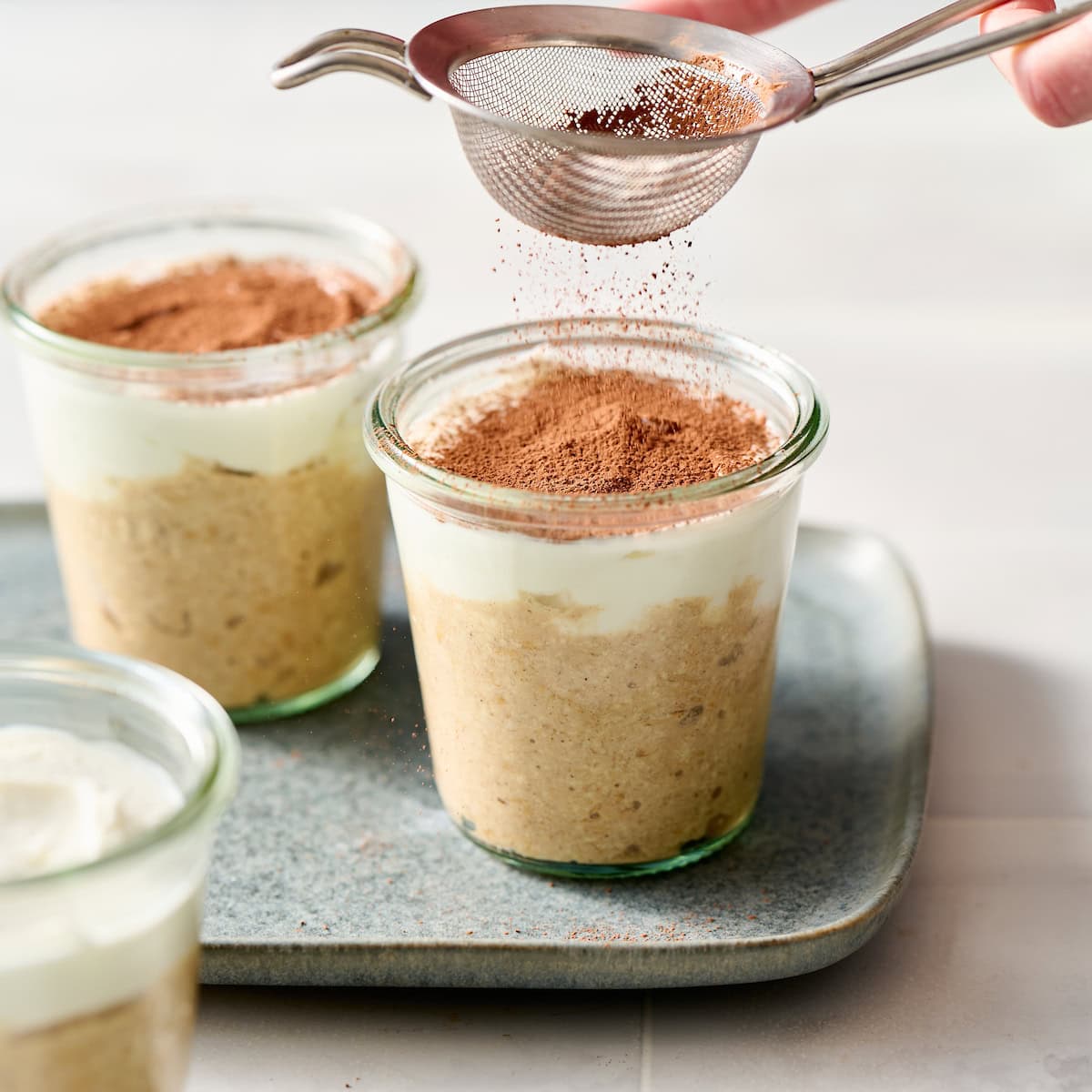 dusting cocoa on top of overnight oats