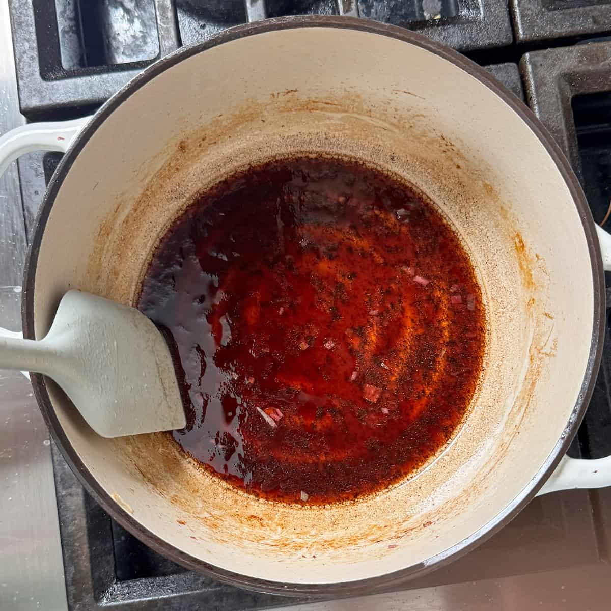 reducing the balsamic and maple syrup over medium heat