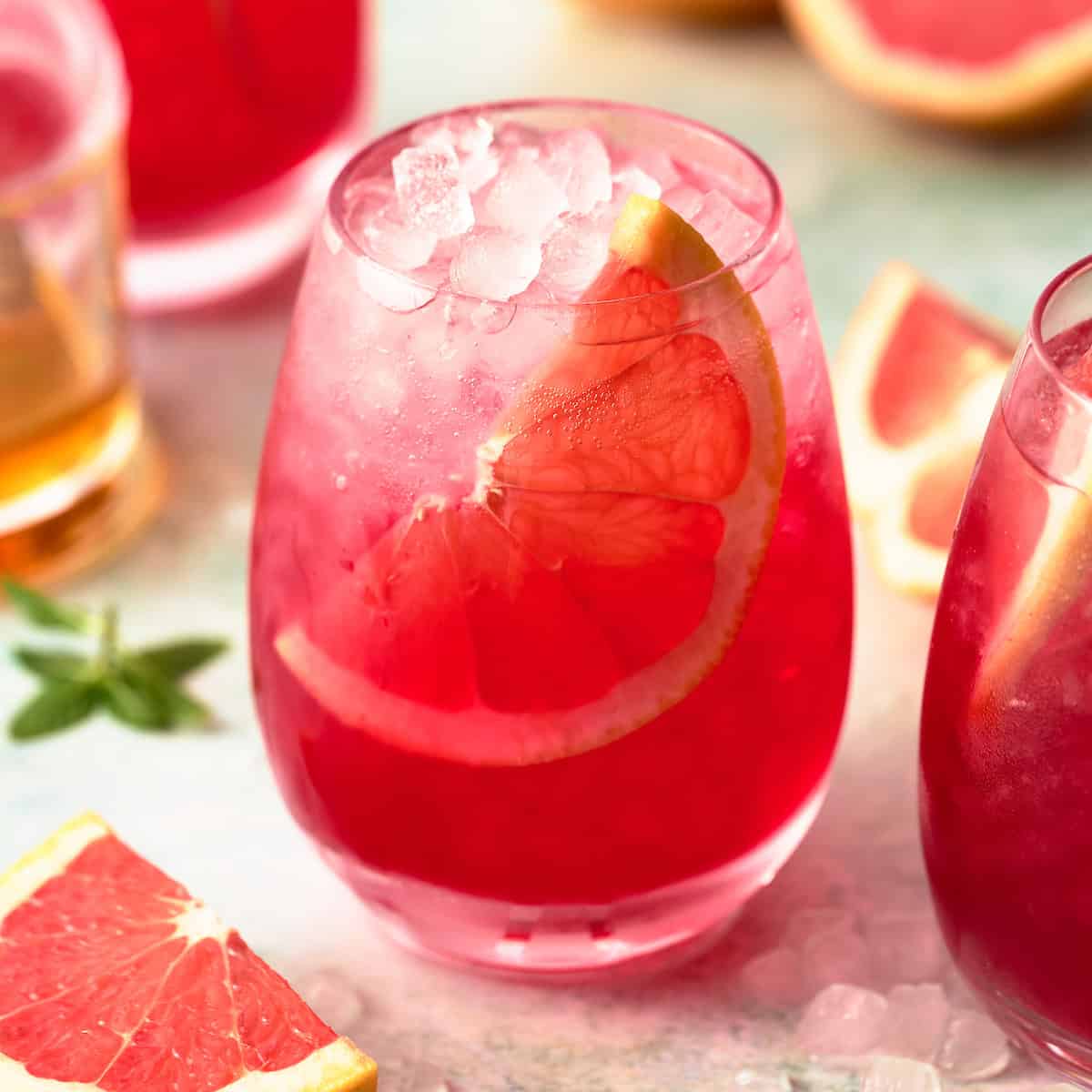 closeup of grapefruit mocktail with a slice of grapefruit in it