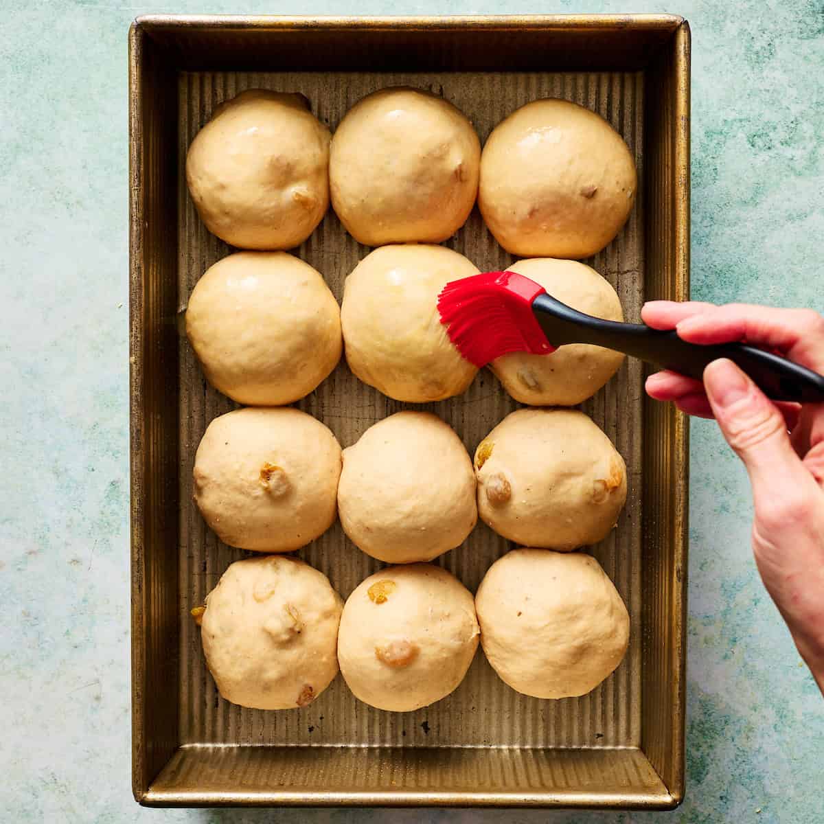 brushing rolls with egg wash