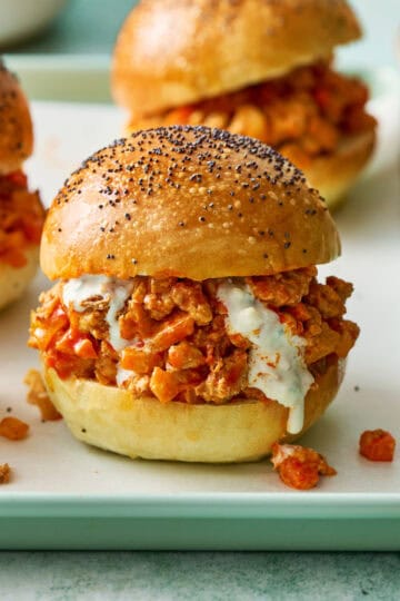 buffalo chicken sloppy joes on homemade sourdough rolls with blue cheese dressing