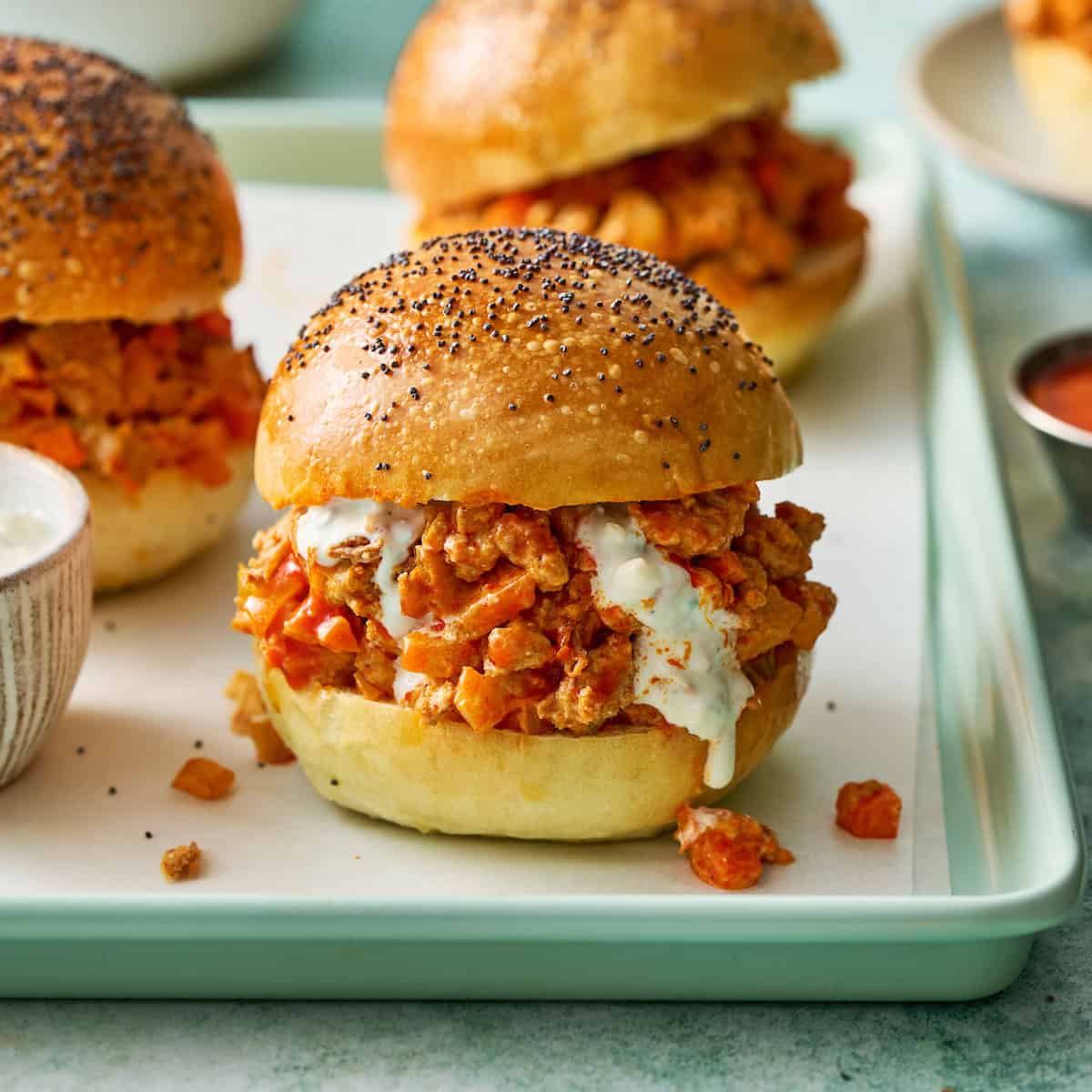 buffalo chicken sloppy joes on homemade sourdough rolls with blue cheese dressing