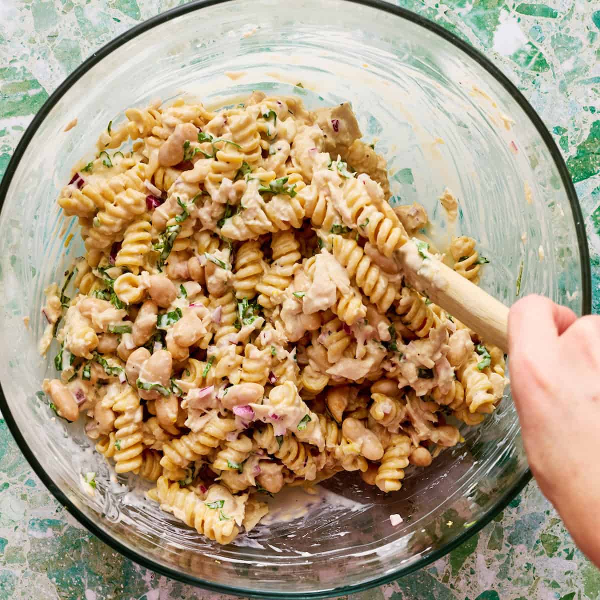 mixing everything together in a mixing bowl
