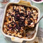 baked oatmeal in a pan with a serving taken out