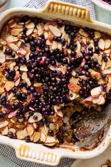 baked oatmeal in a pan with a serving taken out